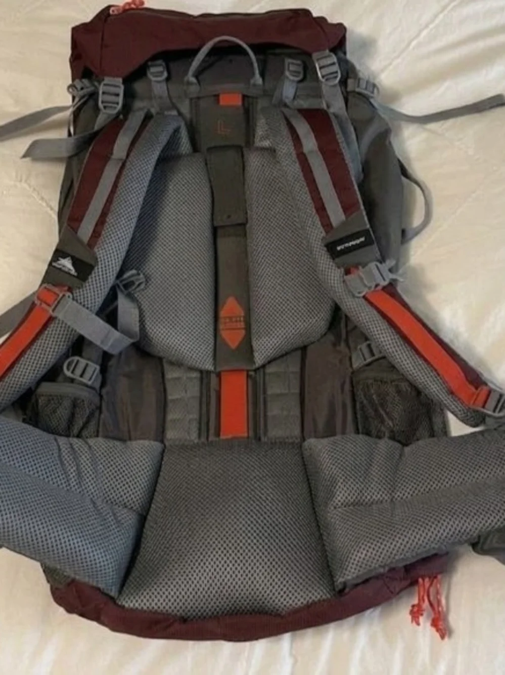 Men's Burgundy Hiking Backpack with Gray Straps and Red Accents